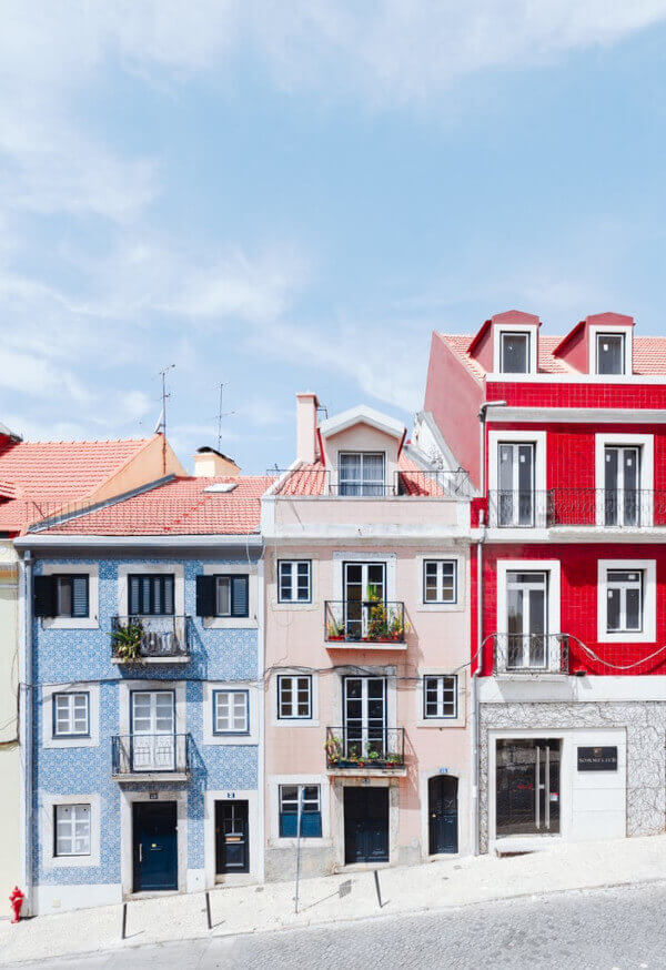 Blue, pink and red townhouses in Portugal
