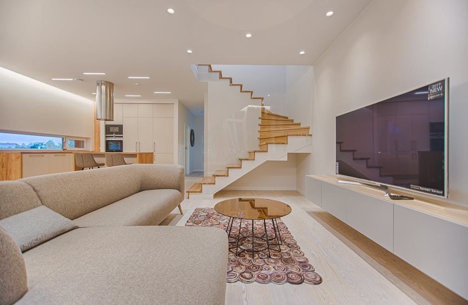 livingroom, kitchen, large staricase, large TV