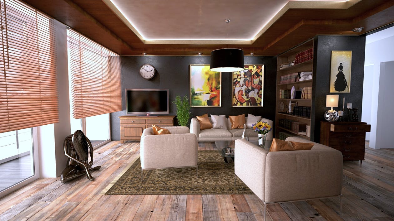 livingroom with white furniture, dark walls