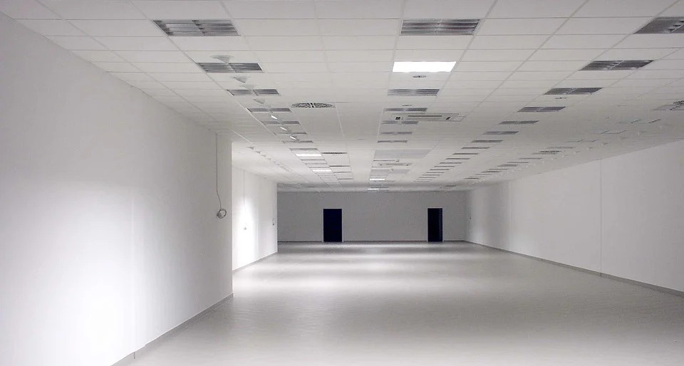 large open space, white walls and floors