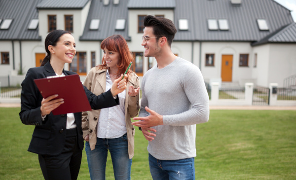 3 people taling, ready to buy a home