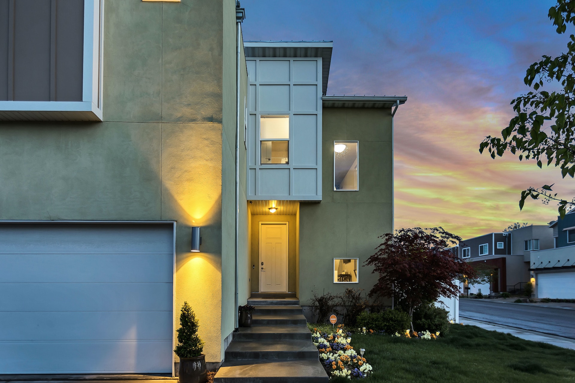 outdoor lights lit up on a house