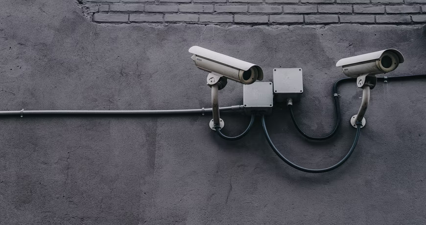 Security cameras on a wall