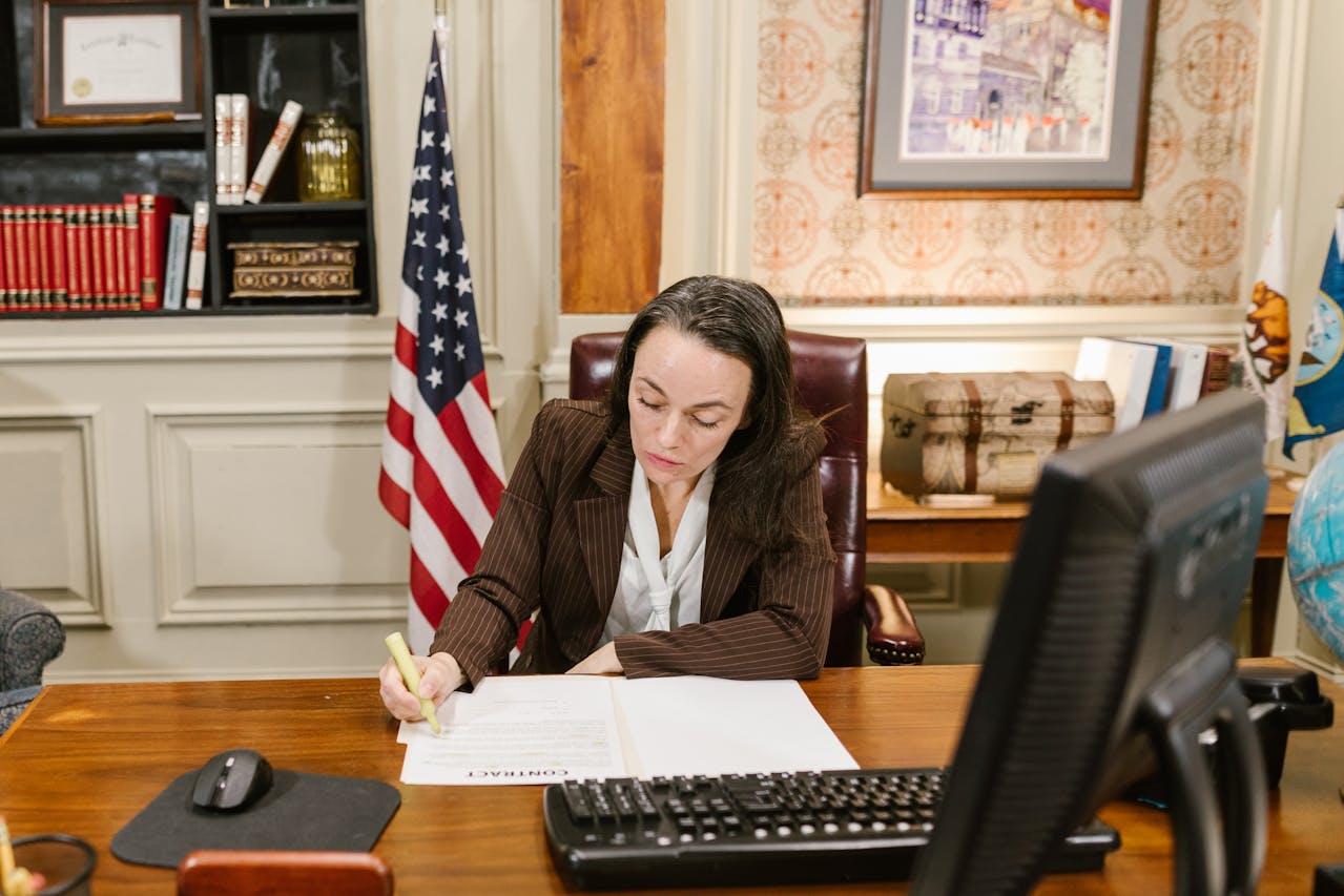 Lawyer working at a desk. Image by Pexels