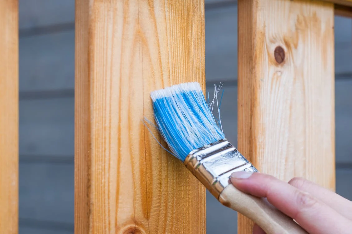 painting a fence