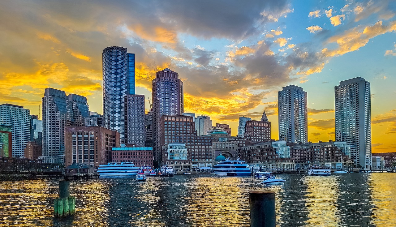 Boston skyline, boston harbor, boats. Image by Pixabay
