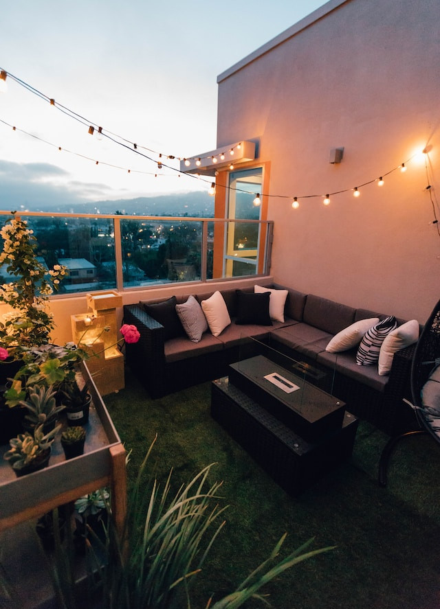 apartment outdoor space, furniture, lights, plants