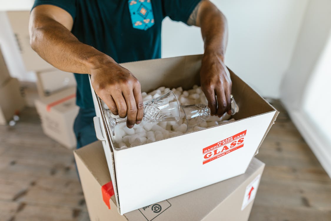 Putting glasses in a box