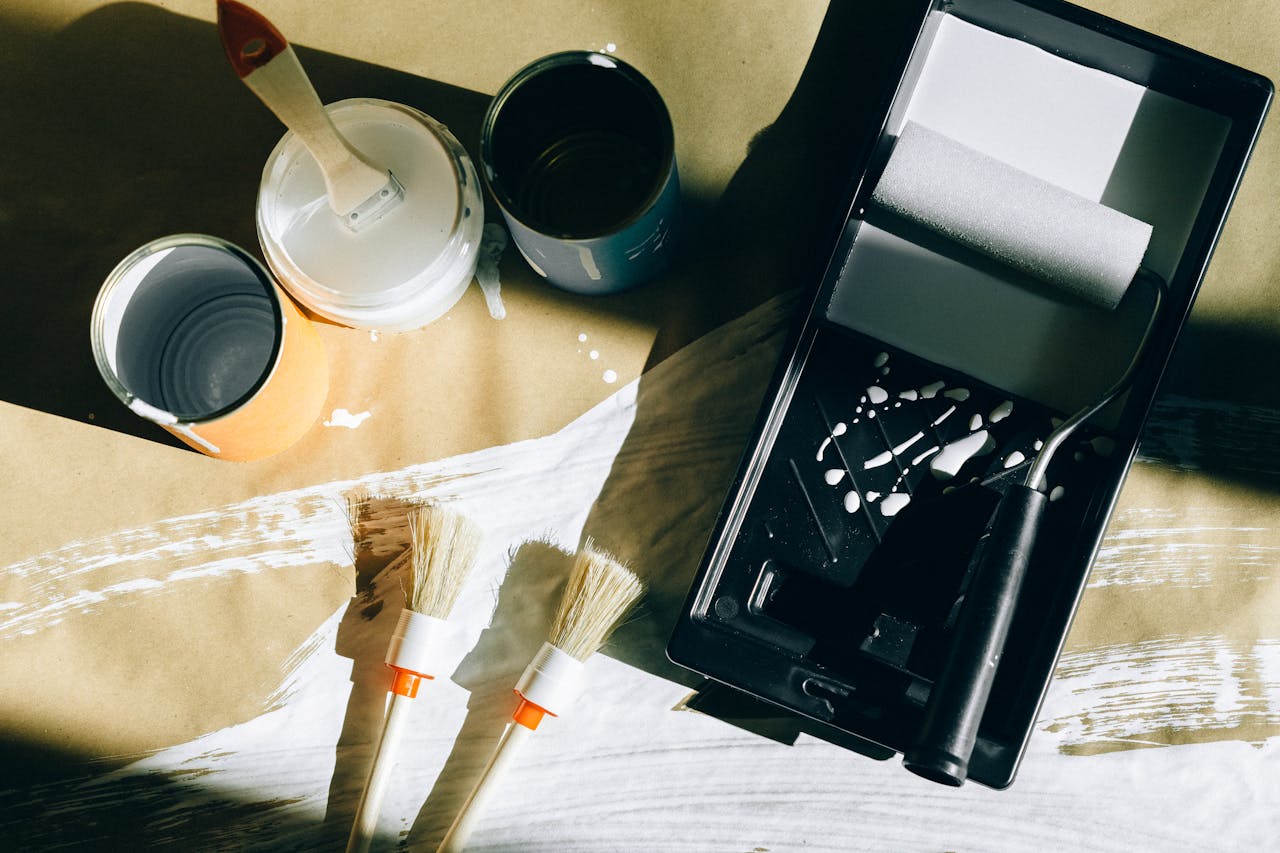 Bucket of paint on the floor. Image by Pexels