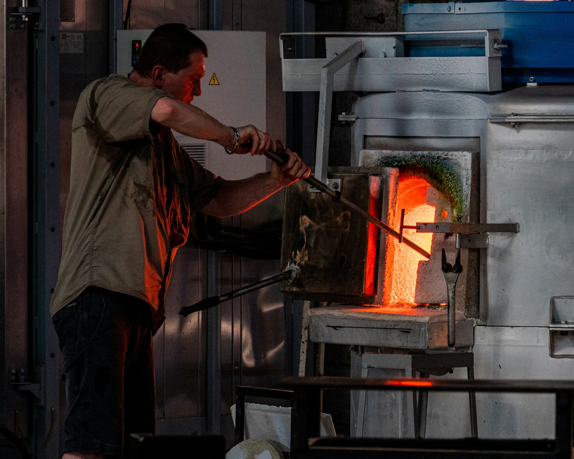 Person next to a furnace