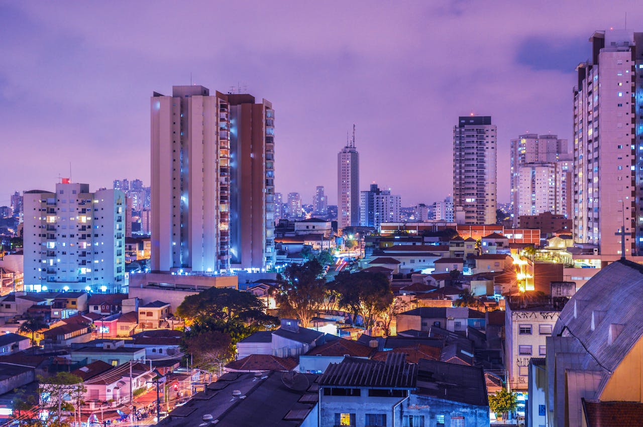City lights, purple sky. Image by Pexels