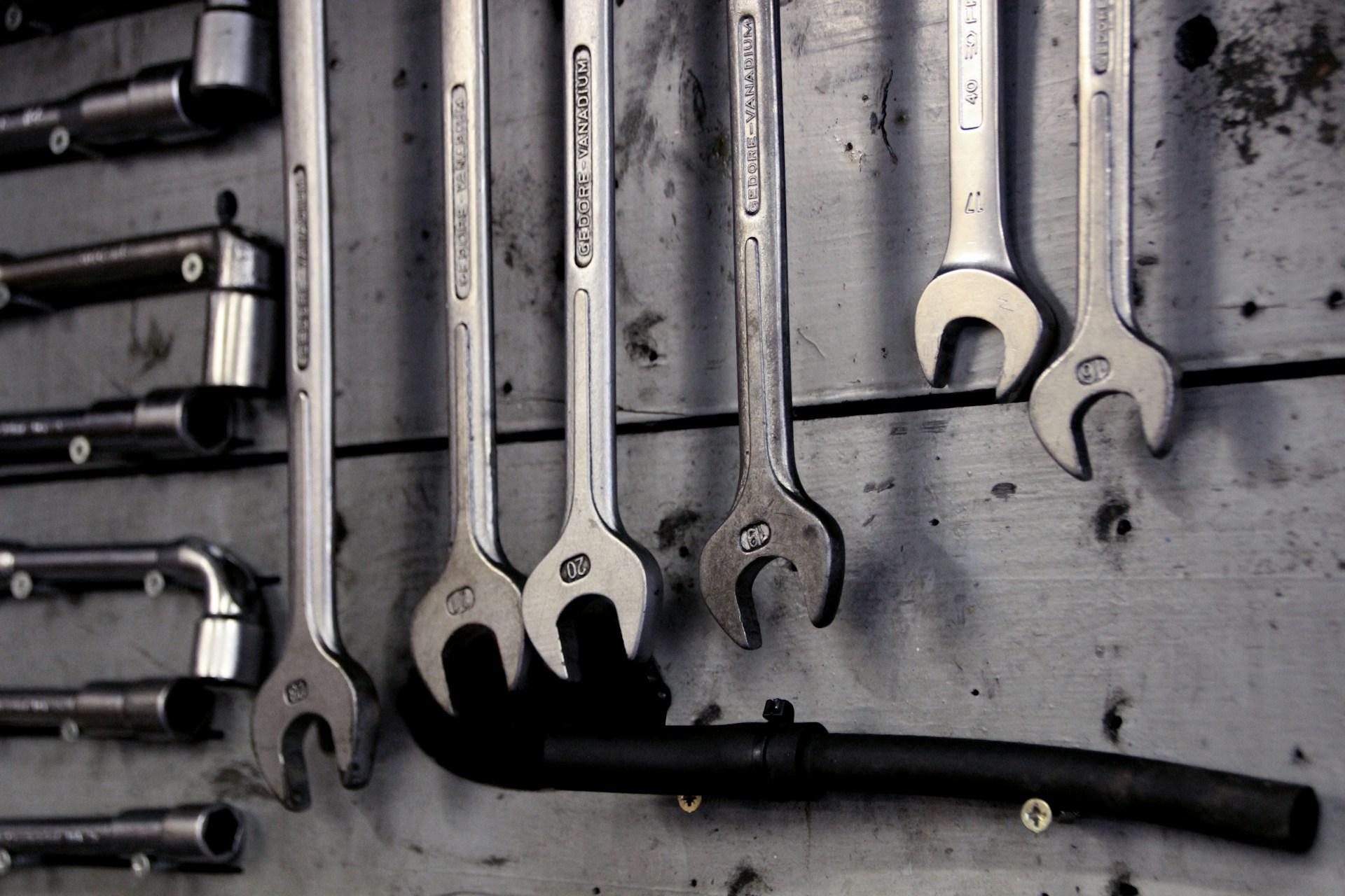 Tools hangin on a wall. Image by Unsplash