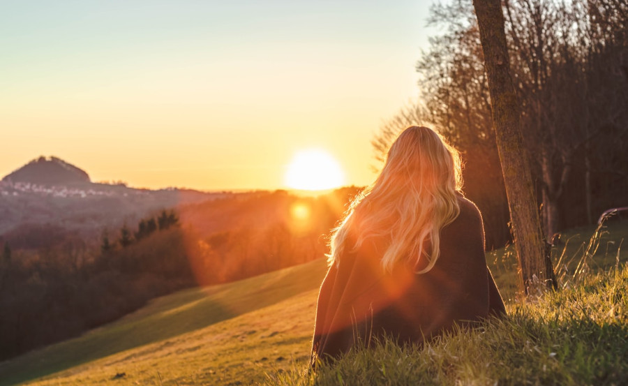 person watching the sunset