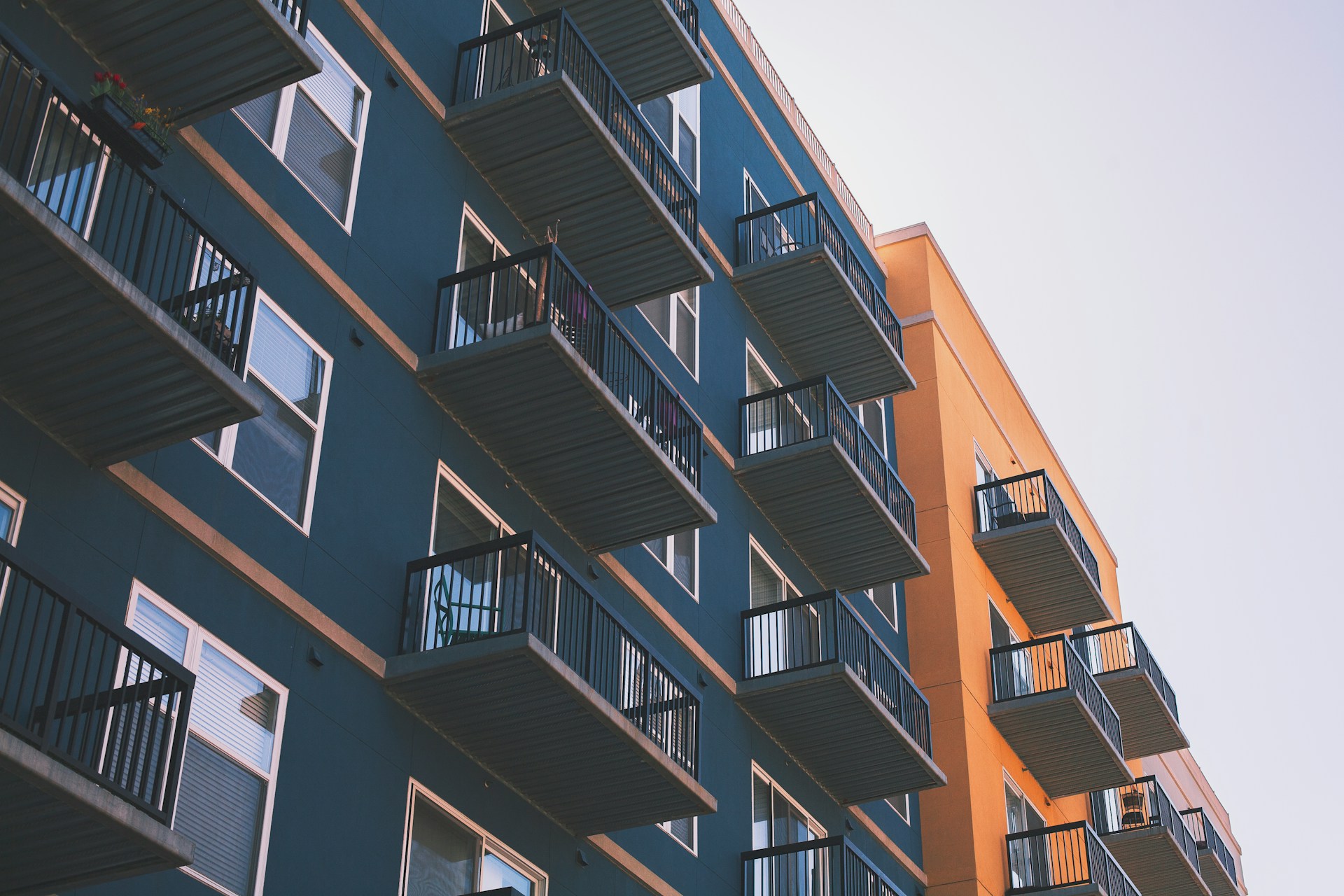 Low angle view of a well-maintained residential building. Image by Unsplash