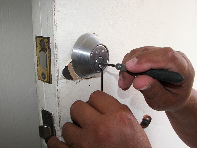 person trying to pick a lock