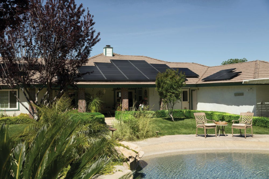 House with solar panels on the roof.