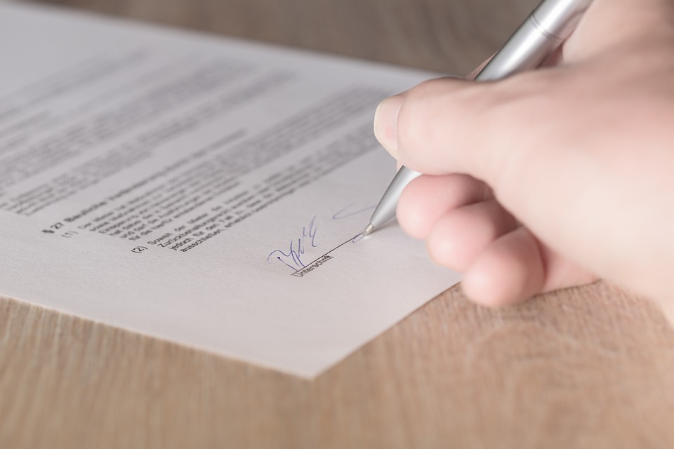 Person signing papers