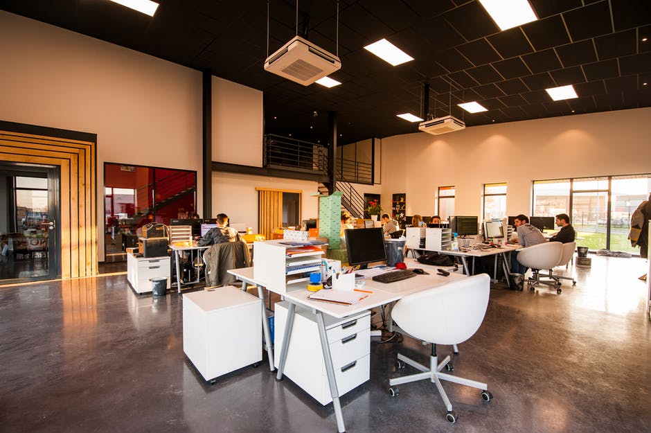 People sitting at their desks working in an office