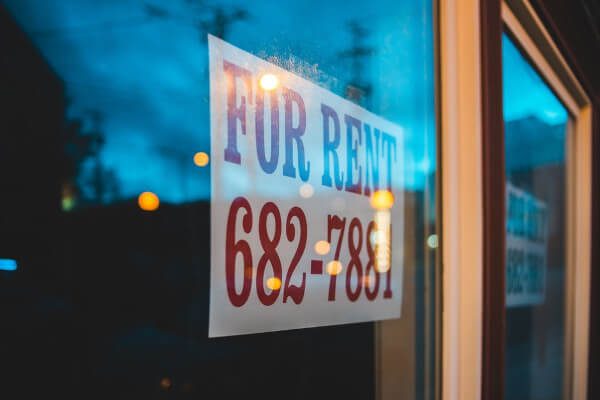 For rent sign in a window