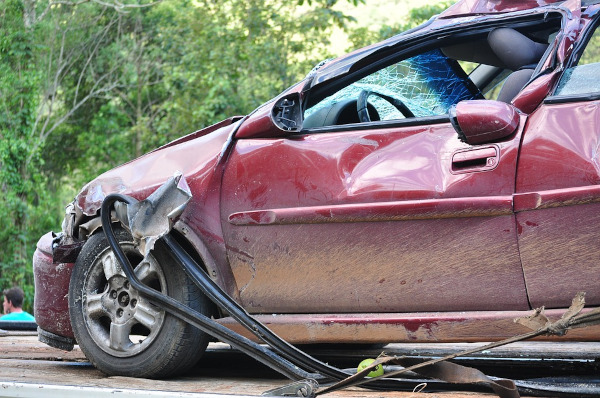 wrecked red car