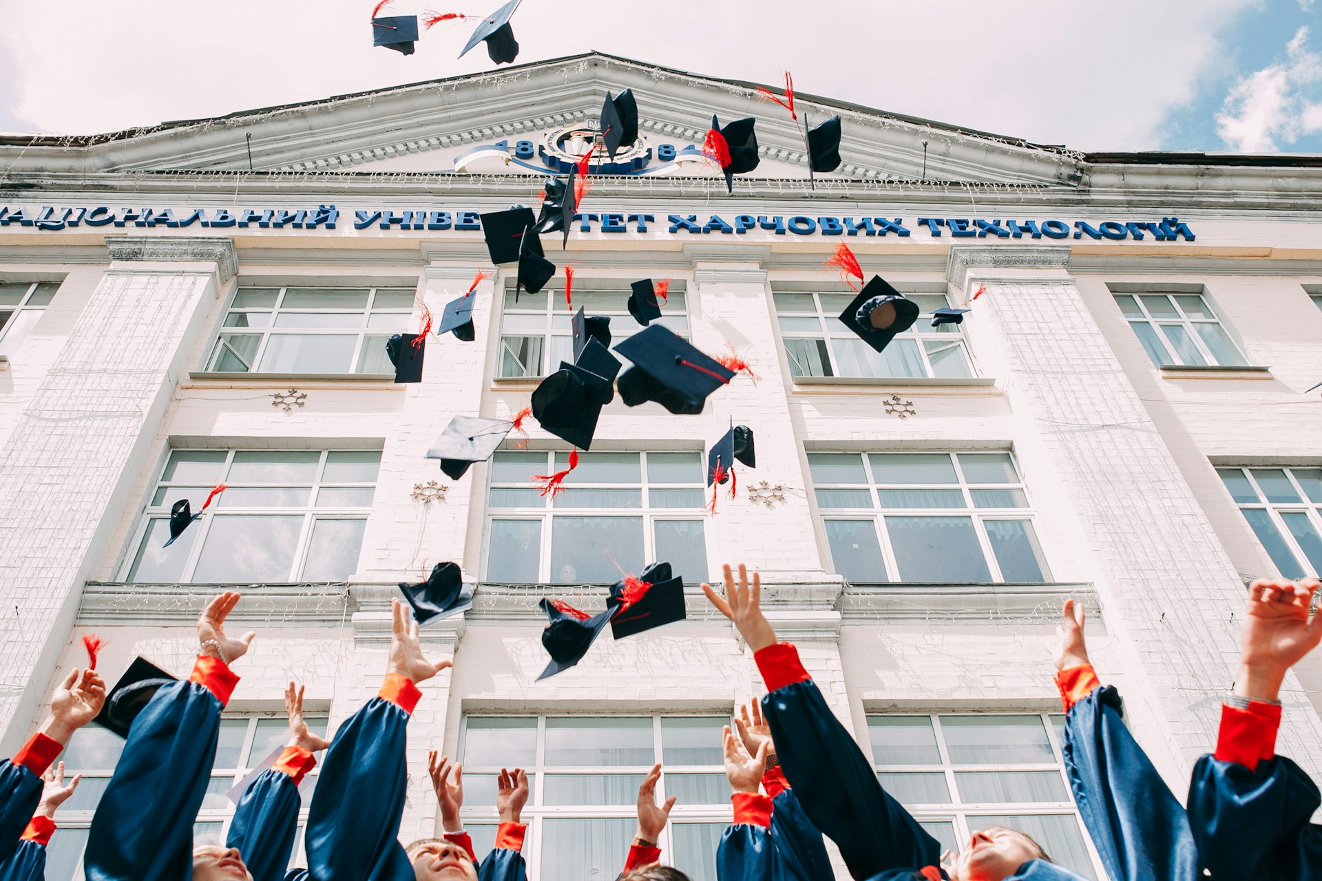 Graduation, hats in the air