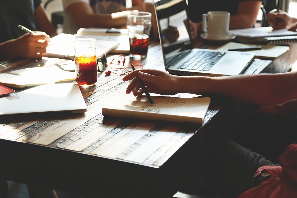 People sitting around a table in an office