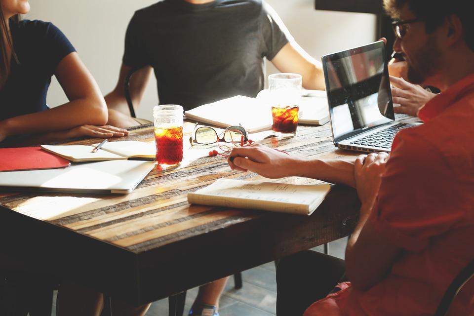 People sitting arund a table in an office