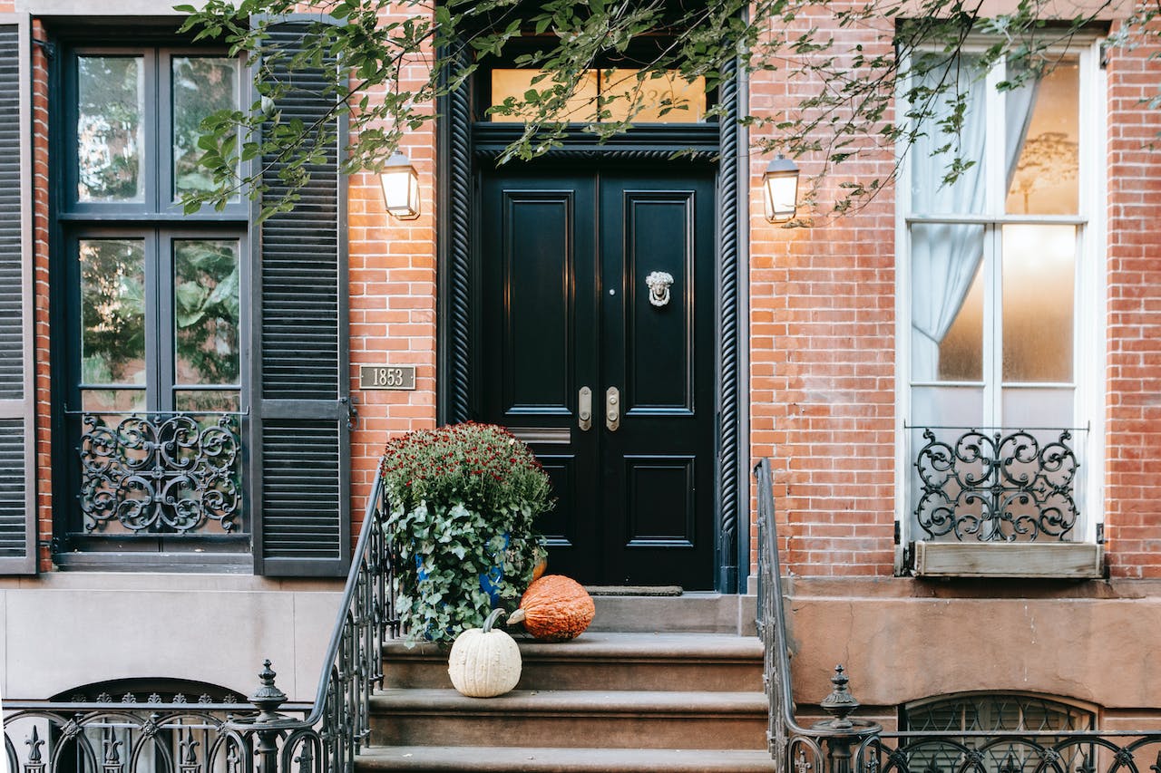 brick building with a black door