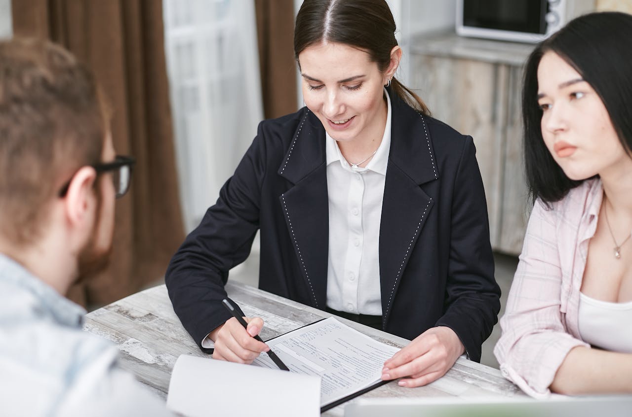 People doing paperwork. Image by Pexels