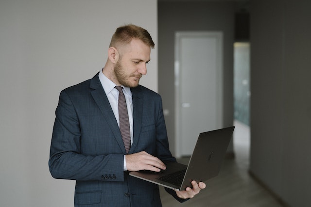 person with a laptop in his hands