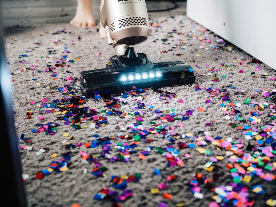 person vacuuming