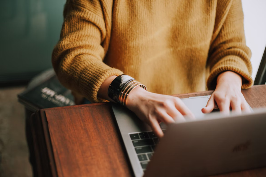 person typing on a computer