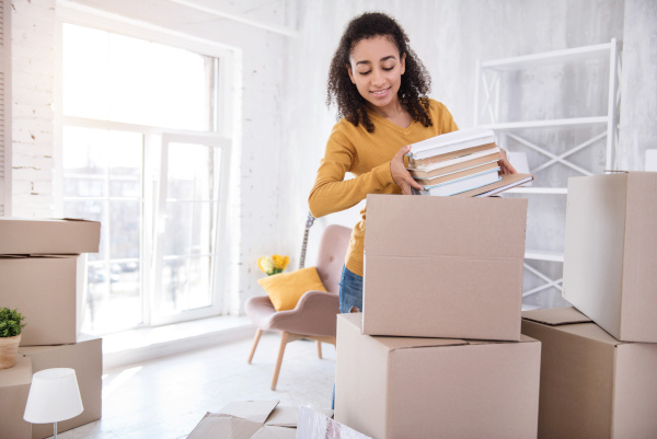 person unpacking a box