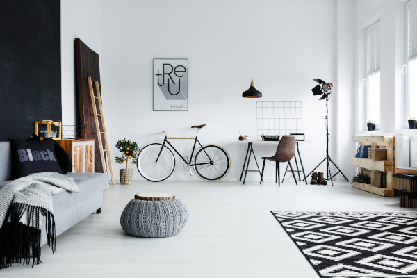 Modern room with furniture, bike.