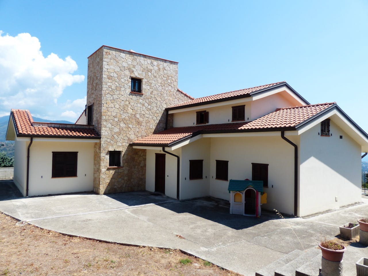 white and brown concrete house