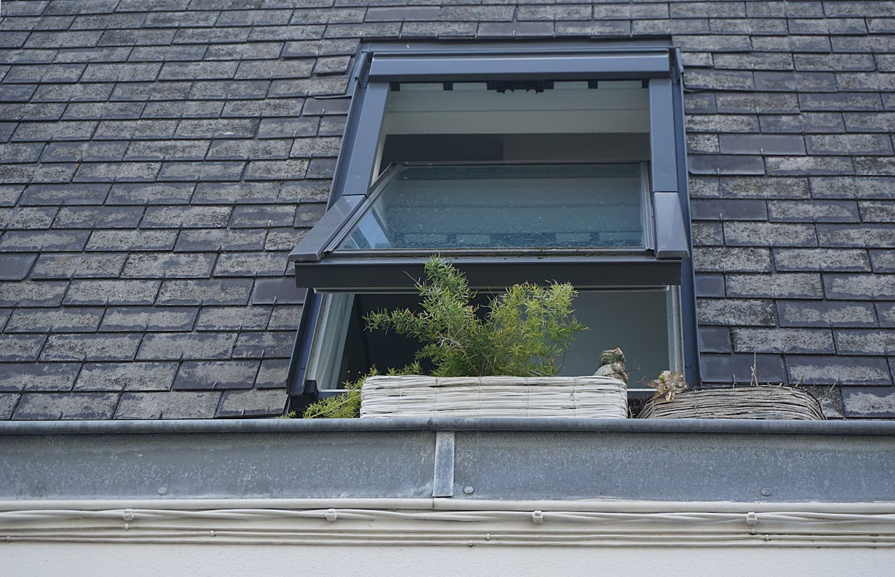 Roof, open window. Image by Pexels