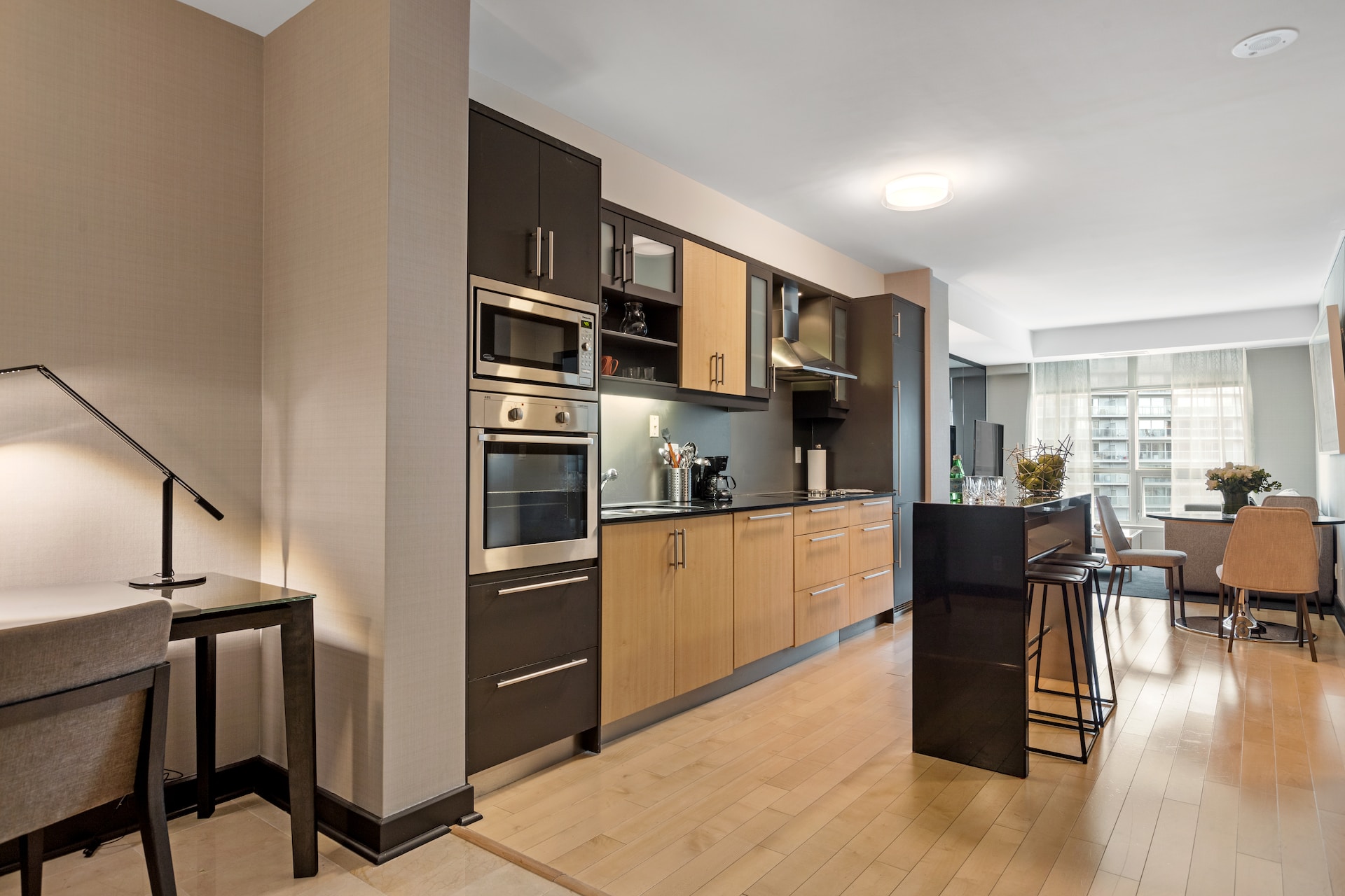 Modern kitchen with dark and light colored cabinets. Image by Unsplash