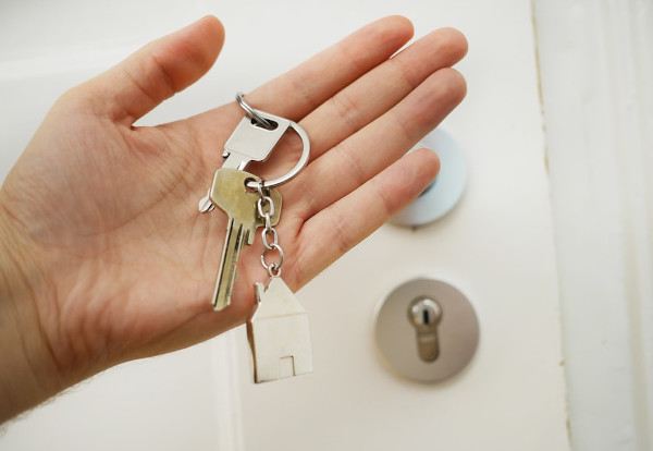 A hand holding keys