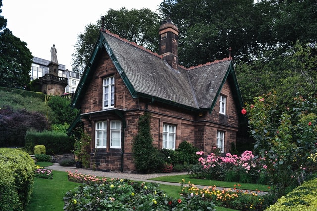 Brick house with plants in the yard