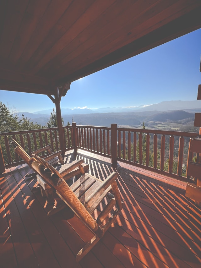 Lodging World, charis on a balcony