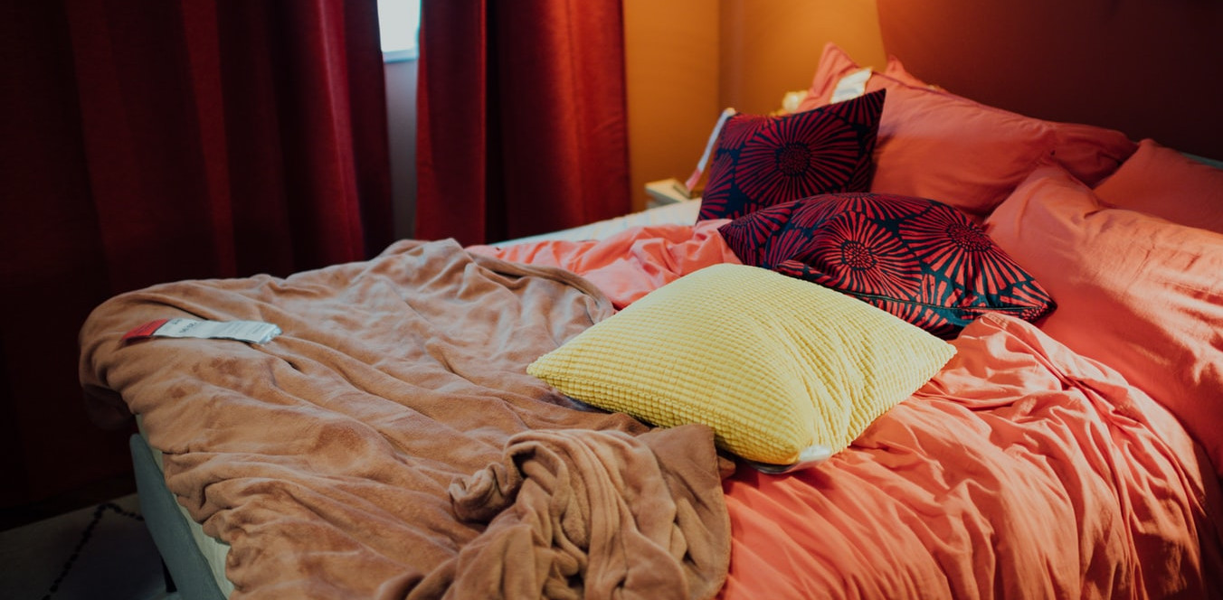 Bunkbed in a room with 2 large windows