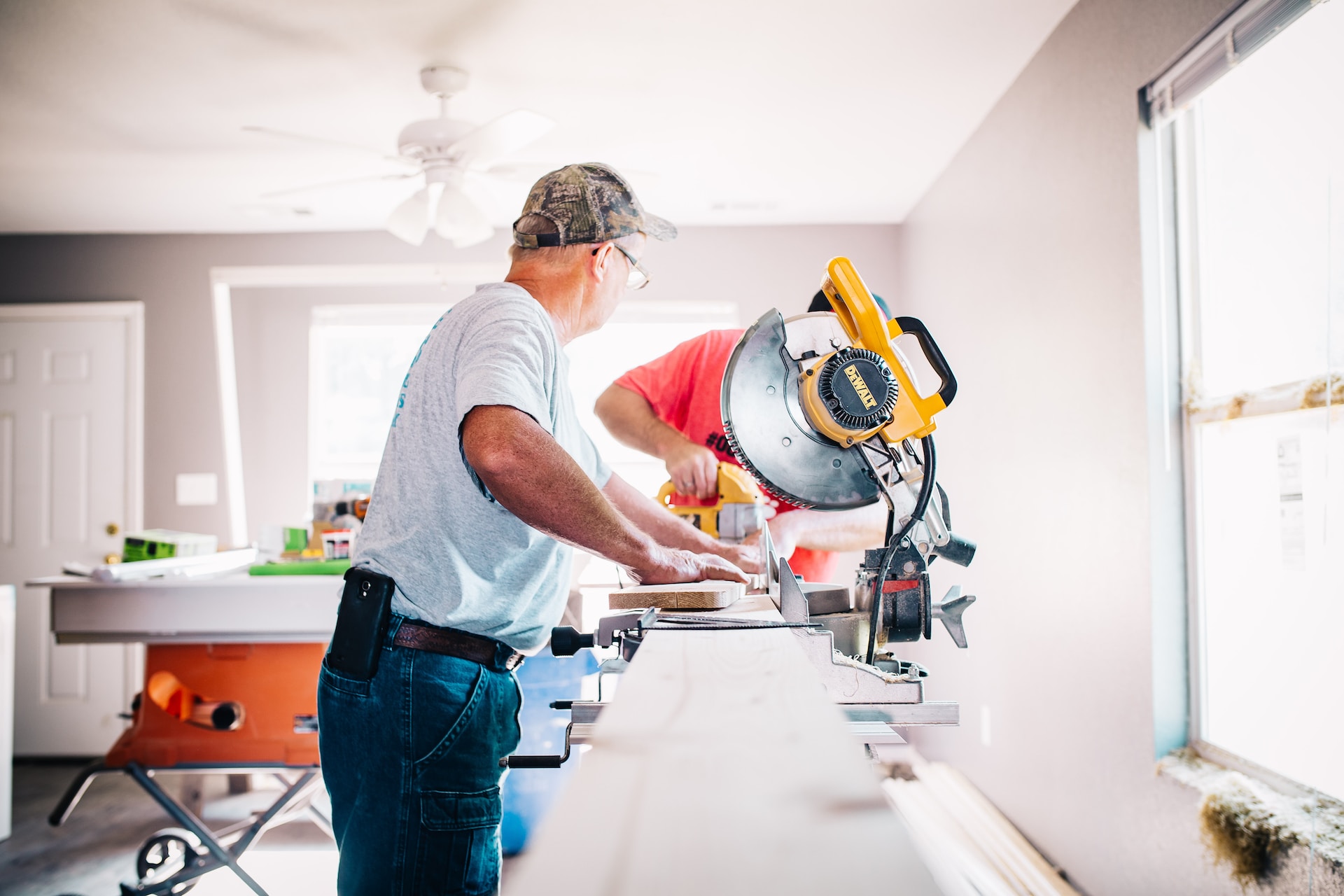 2 people working with tools